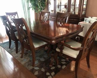 Beautiful double pedestal dining table with two leaves; set of six dining chairs with openwork lyre backs and upholstered seats