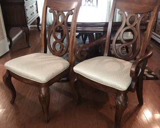 Set of six dining chairs with openwork lyre backs and jacquard upholstered seats including two armchairs and six side chairs
