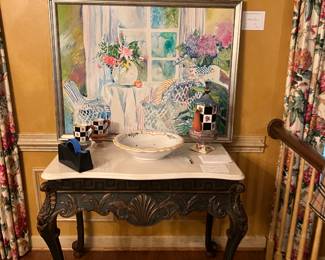 Most magnificent hand carved shell table with white marble top.