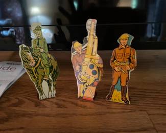 33 of these vintage die cut metal figures