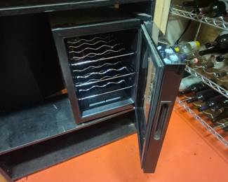 Wine cooler. Glass will need to be replaced