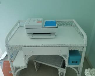 Wicker desk . Color printer. Wicker lap table