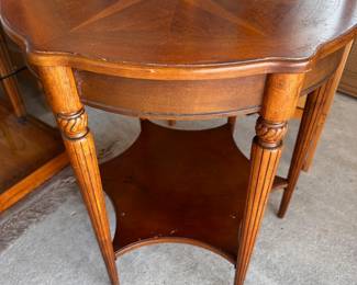 Octagonal wooden side table with inlay design.