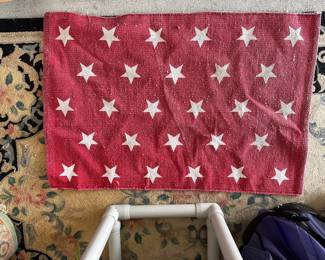 Red and white star pattern throw blanket.
