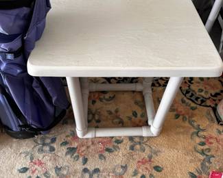 White square side table.