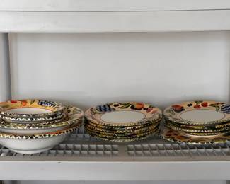 Collection of decorative plates - Assorted colorful patterned ceramic plates with floral designs