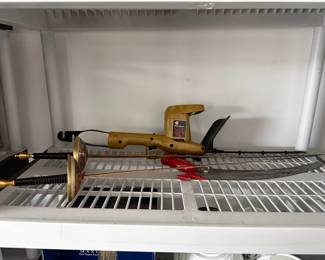 Yellow electric leaf blower in freezer shelf.