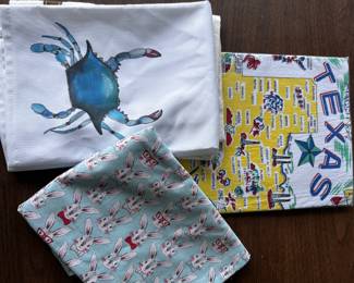 Assorted kitchen towels - Collection of decorative towels including blue crab design and floral patterns