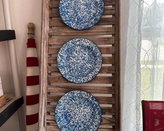 Wooden tray with blue and white decorative plates.