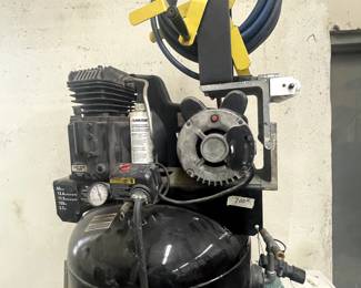 husky 220 v 60 gallon Air compressor with hose reel and on wheels for easy moving
