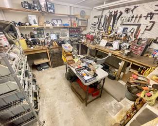 Work Room full of misc tools. Hand tools. Buffets. Sanders. Routers. Jacks. Wrenches. Hatchets.... so. much. stuff.