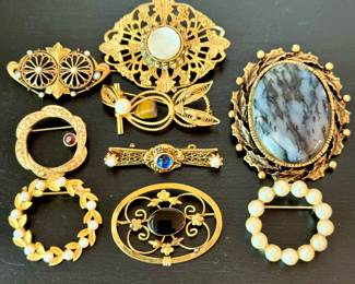 Shop this sale in person for vintage costume jewelry, brooches starting at $20.