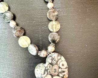$88; Crinoid fossil necklace