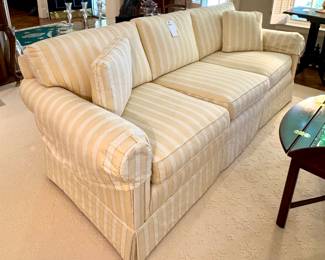 $600 - custom upholstered striped sofa with loose back pillows and skirt, in great condition; 86x35x33