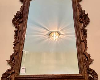 $48 - Framed, vintage resin mirror; 25x46
