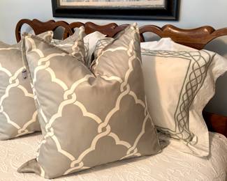 ($150; queen bed with carved, wooden headboard, mattress and box spring included) ($24 each - 3 available; gray and white lattice throw pillows)