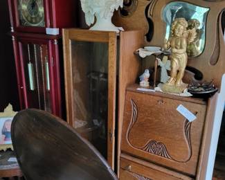 Gun cabinet with built in desk grand father clocks