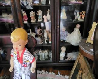Large antique display cabinet set of buster brown store display dolls