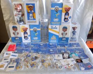 BOX UCLA MEMORABILIA INCLUDING PINS, BOBBLE HEAD AND MORE
