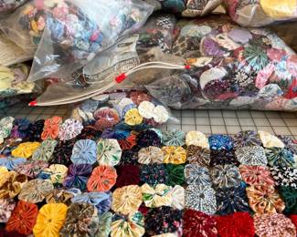 Thousands of vintage fabric yo-yos ready to turn into a quilt or project of your dreams!