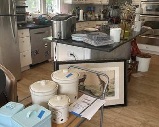 Collectibles, milk glass collection, food pantry organizer items. Rolling carts. Cutting boards, pizza stones.