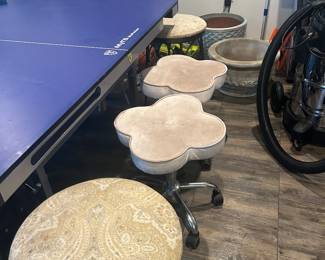 Rolling stools and wrought iron bar stools