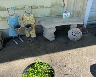flower holders and cement bench