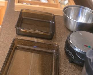 Pyrenees, nested metal bowls, wooden silverware drawer with misc. silverware pieces