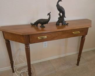 Entryway table with drawer with 2 peacock figurines