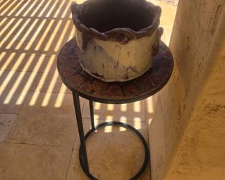 Metal stand with ceramic planter