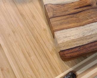 Lots of kitchen items including these cutting boards.