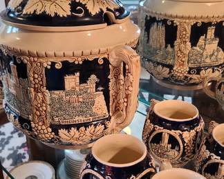 Detailed antique German punch bowel, with steins.
