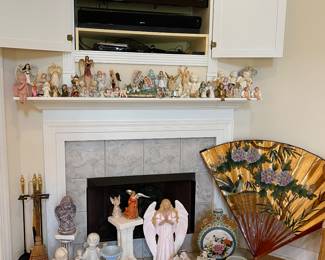 Angels of every shape and size. Flat screen smart tv. Sound bar. Oriental pieces.