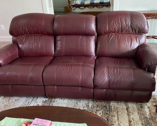 Well loved LazyBoy double reclining leather sofa
