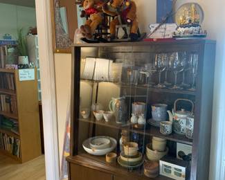 Mid century cabinet filled with beautiful glassware, some old, some new