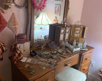 Vanity dresser (part of the bedroom set), singer brand storage stool, and jewelry boxes, jewelry and more