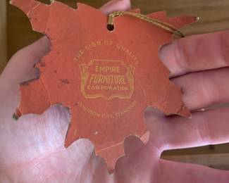 The vintage furniture still had a tag on it!