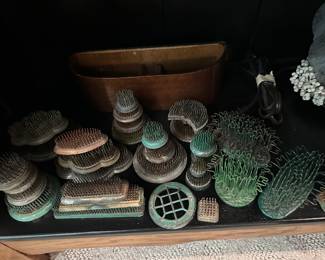 Antique metal flower frogs