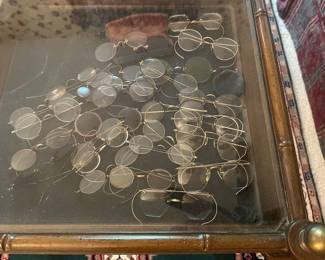 Display table shown with vintage glasses