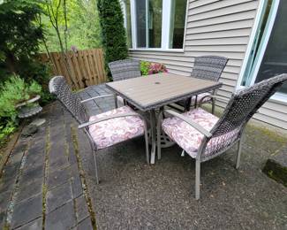 Table and 4 Chairs $174.99 Umbrella Stand $44.99