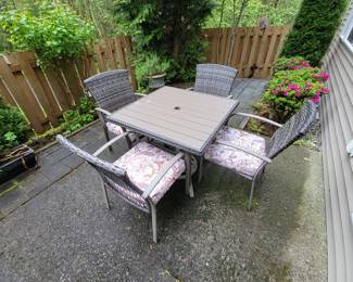 Table and 4 Chairs $174.99 Umbrella Stand $44.99
