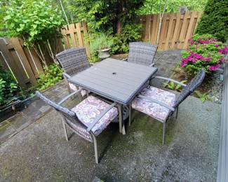 Table and 4 Chairs $174.99 Umbrella Stand $44.99