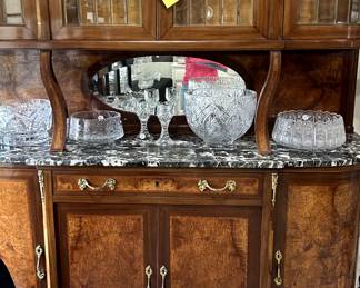 Beautiful burl wood hutch with marble top and beveled mirror.