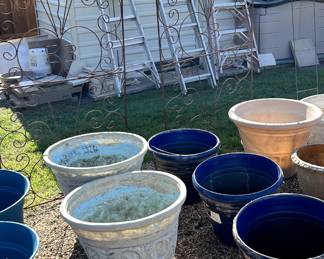 Yard Art, ladders, and multiple pots to choose from.