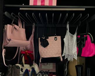 You will find many feminine accessories including some lined with lace and accented with bows. Kate Spade handbags.