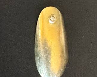 Gold fingernail! 
