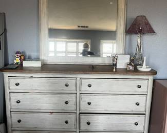 8 drawer dresser and matching mirror.
( decorative accessories $3.00 -$12.00)
Eiffel Tower lamp: $12.00 