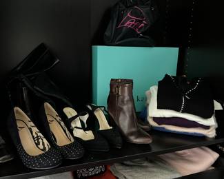 You will find many pairs of shoes by various makers including Michael Kors and Coach