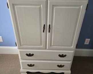 Linens storage armoire