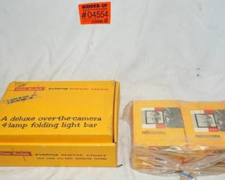 antique CineKodak folding movie light new in box